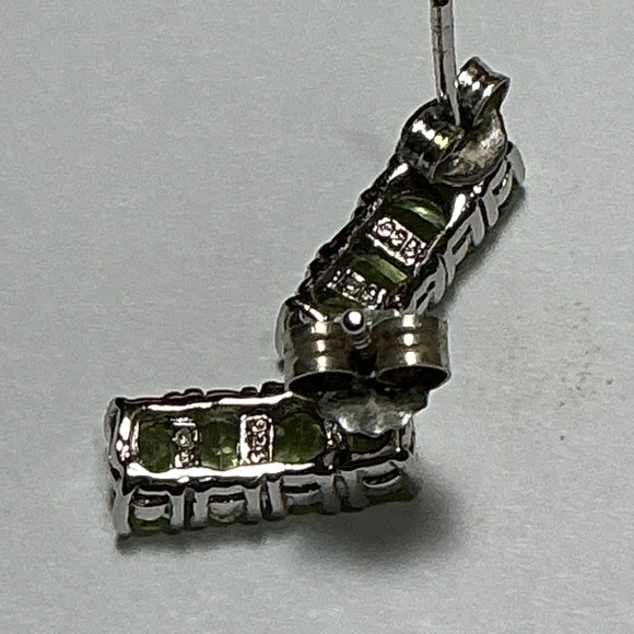 Sterling Silver Stud Earrings with Faceted Peridot Stones l 9/16 inch long - Picture 9 of 10